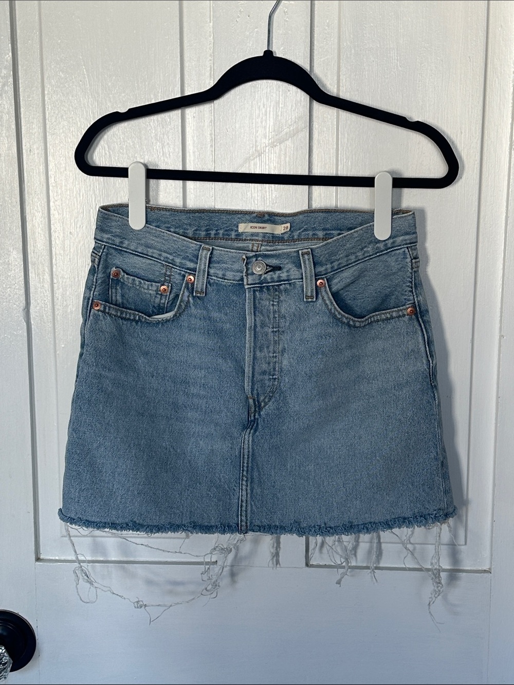 Levi's “Icon Skirt” Light Blue Denim Mini Skirt with Frayed Hem